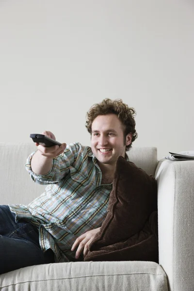 Man using remote control — Stock Photo, Image
