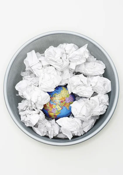 Waste bin with globe — Stock Photo, Image