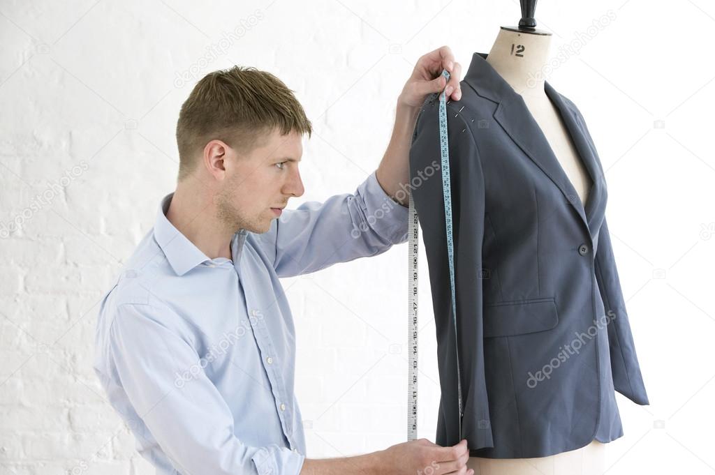 Tailor measuring jacket sleeve