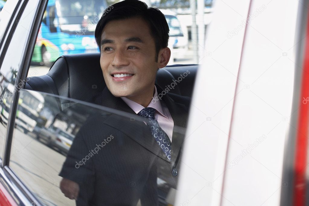 Businessman looking out of window