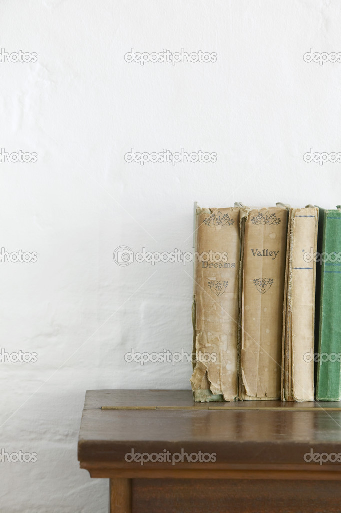 books on wooden chest