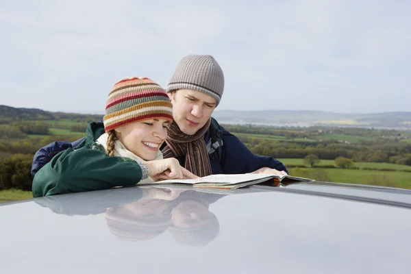 Couple Consulting at Map — Stock Photo, Image