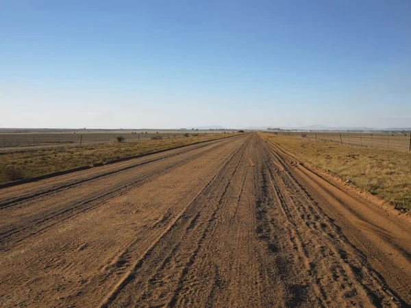 Onverharde weg — Stockfoto