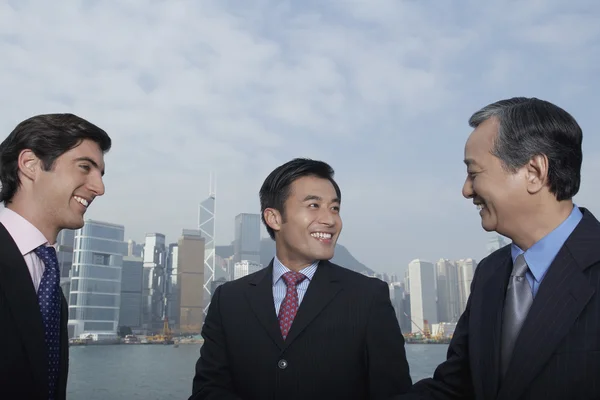 Business men smiling — Stock Photo, Image