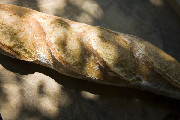 Baked baguette loaf — Stock Photo, Image