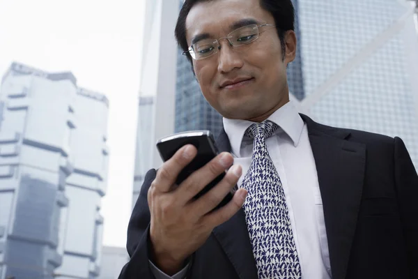Businessman  text messaging — Stock Photo, Image