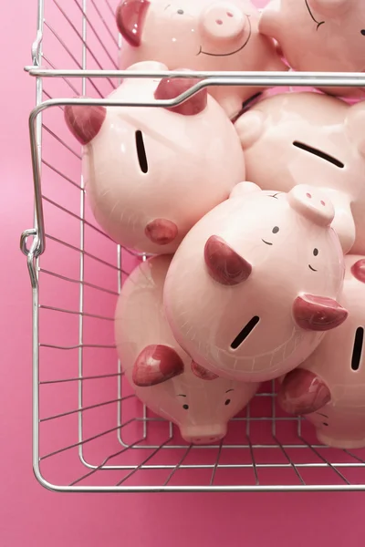 Shopping cart with piggy banks — Stock Photo, Image