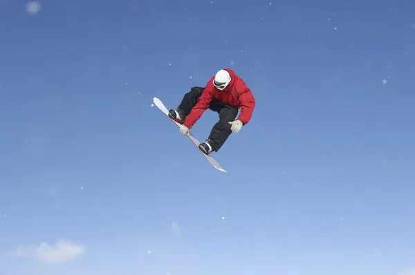 Saut de snowboarder — Photo