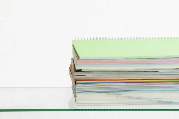 Stack of coloured stationery — Stock Photo, Image