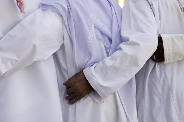 Traditionally dressed Muslim men perform a song — Stock Photo, Image