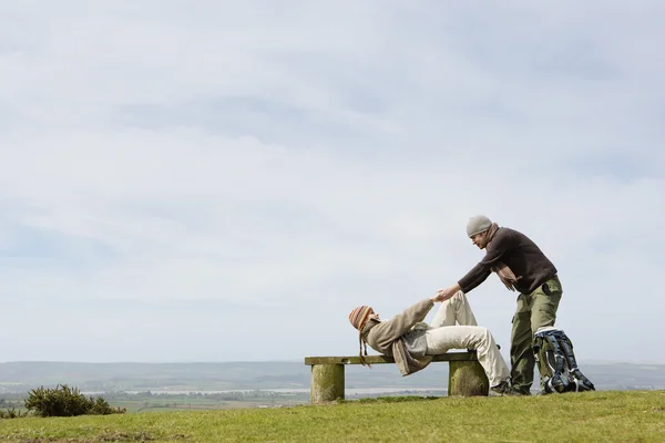 Man Helping Girlfriend up — Stock Photo, Image