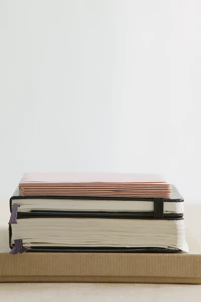 Stack of books and paper stationery — Stock Photo, Image