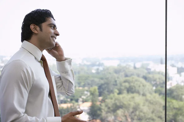 Business man using cell phone — Stock Photo, Image