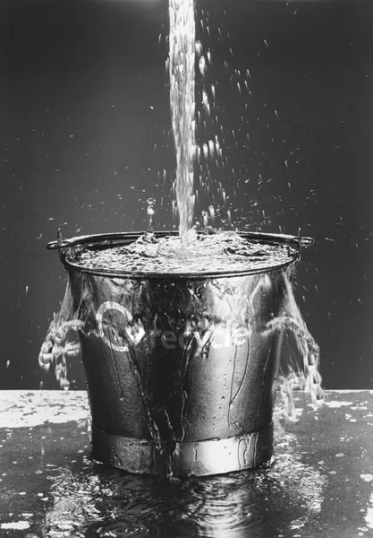 Water Pouring in Bucket — Stock Photo, Image