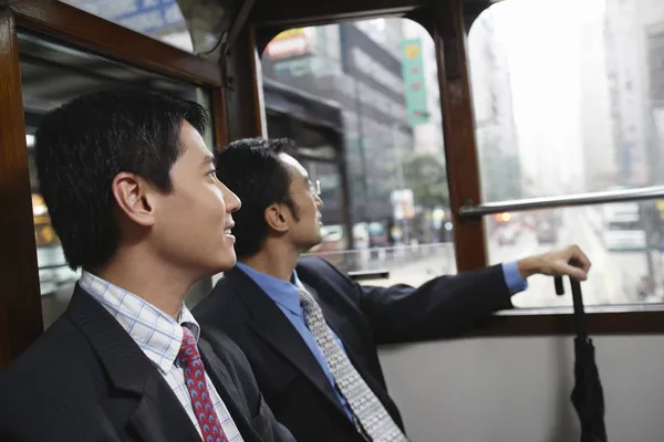Businessmen on Trolley — Stock Photo, Image