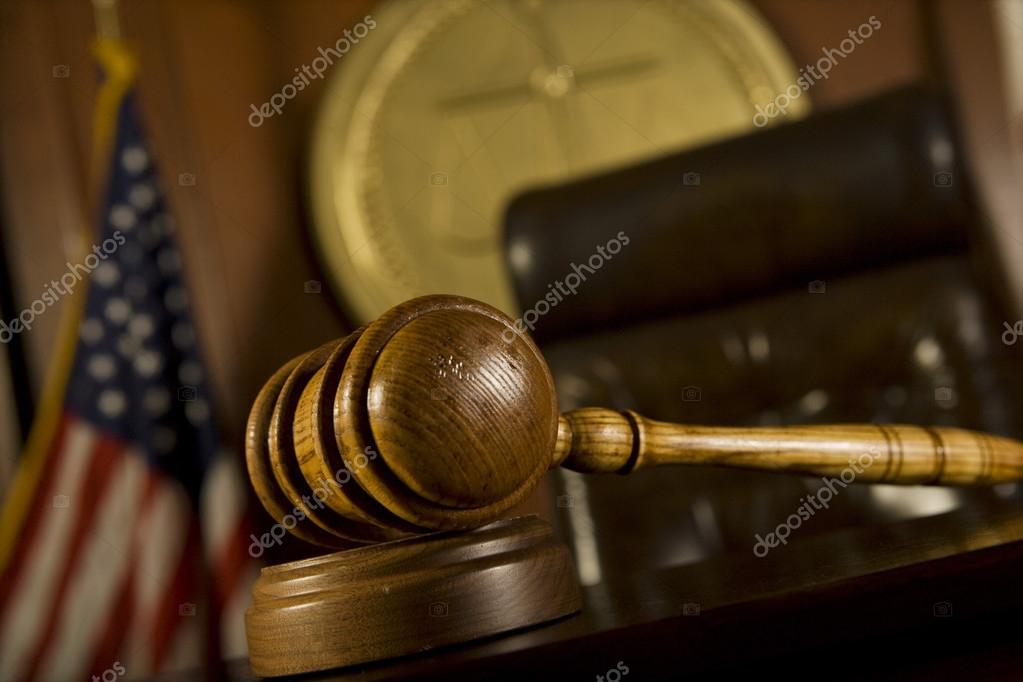 Gavel in court room — Stock Photo © londondeposit 33893259