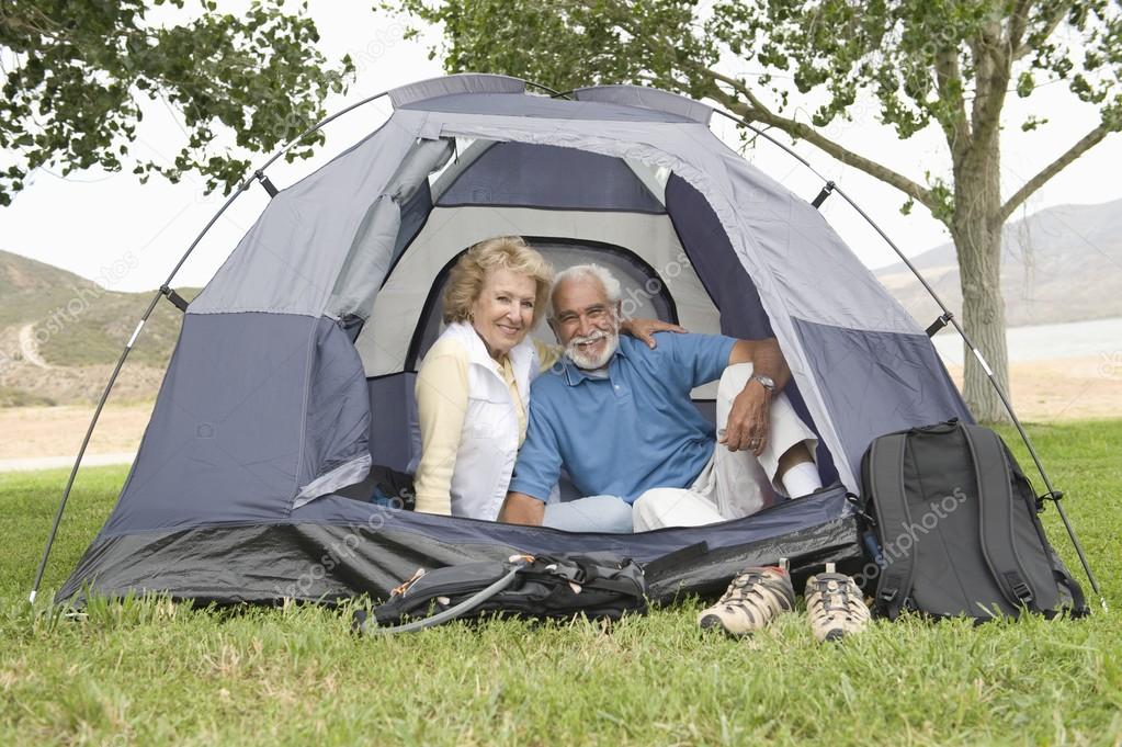 Couple at entrance to tent