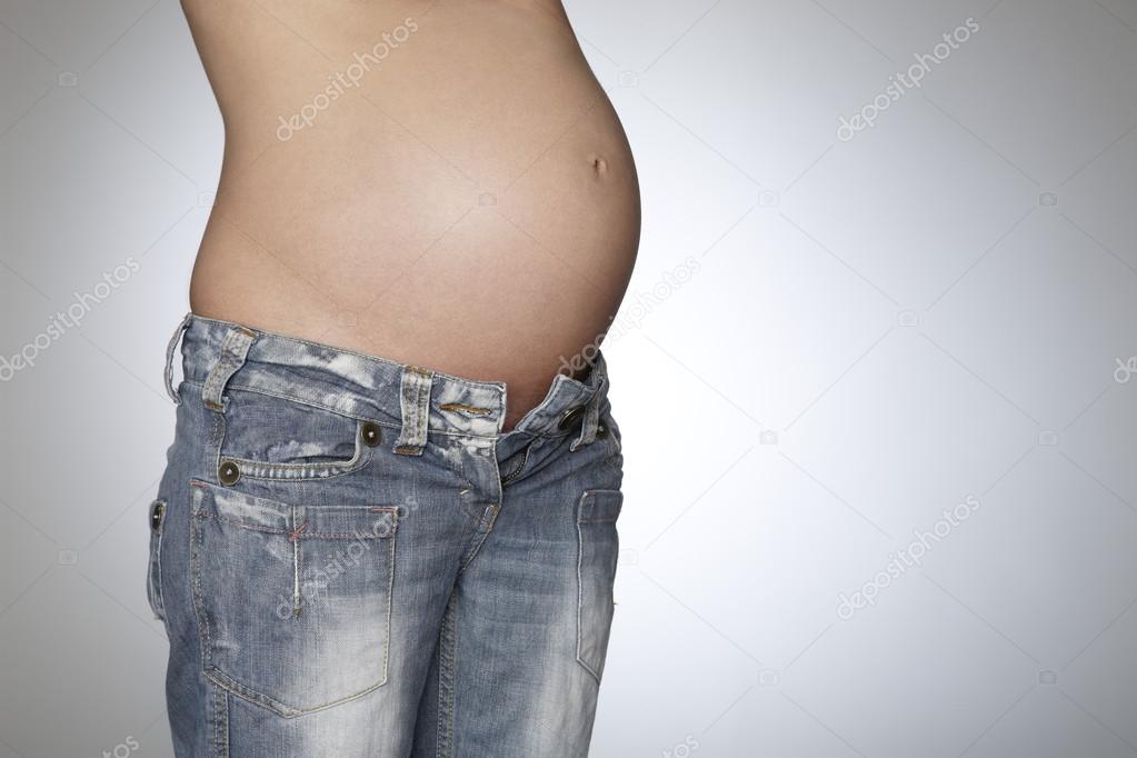 Pregnant woman wearing jeans