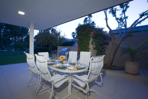 Table set for meal on patio — Stock Photo, Image