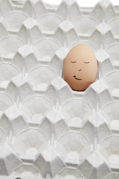 Funny face drawn on egg — Stock Photo, Image