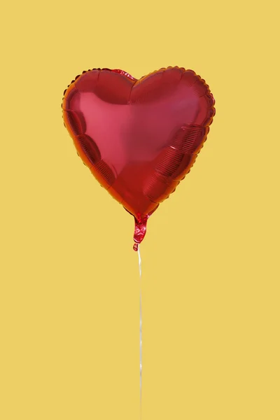 Red heart shaped balloon — Stock Photo, Image