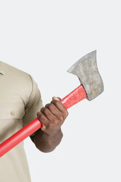 Male hand holding axe — Stock Photo, Image