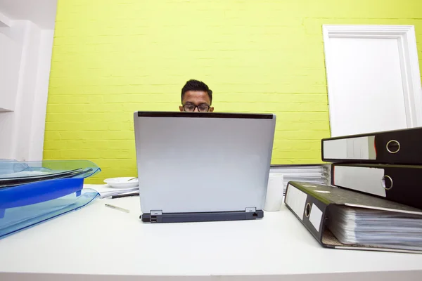 Indian man on laptop — Stock Photo, Image