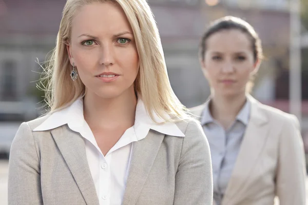 Businesswoman with female colleague — Stock Photo, Image