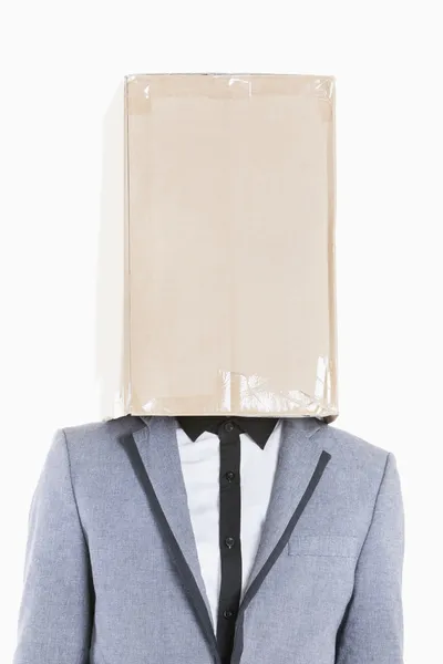 Young boy with box over his face — Stock Photo, Image