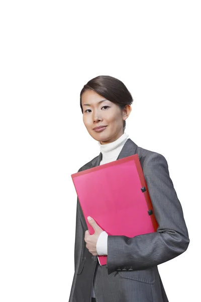 Young businesswoman with pink file — Stock Photo, Image