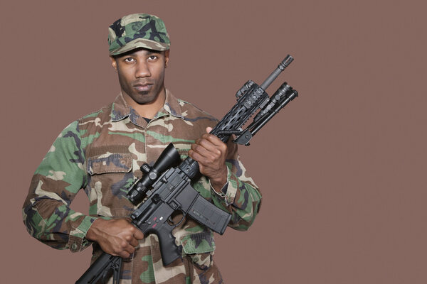 US Marine Corps soldier holding M4 assault rifle