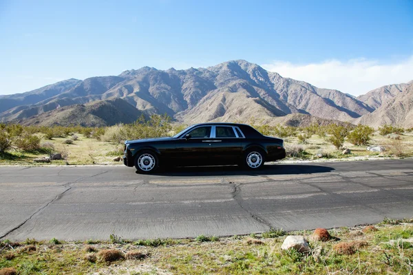 Rolls Royce travelling on country — Stock Photo, Image