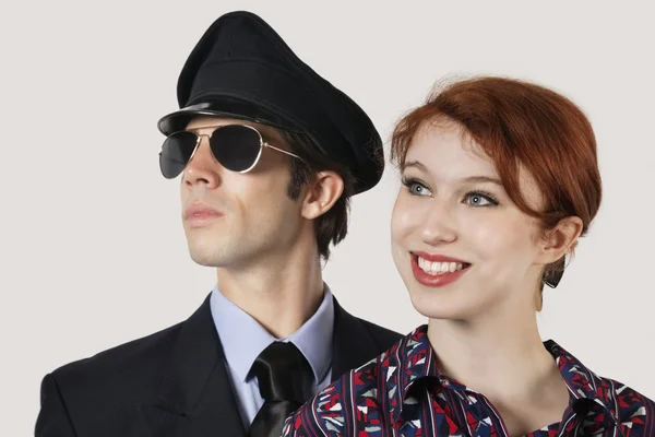 Female flight attendant and pilot — Stock Photo, Image