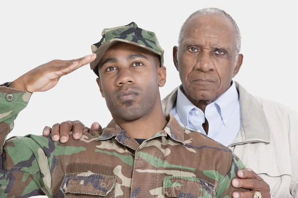 US  Marine Corps soldier with father saluting — Stock Photo, Image