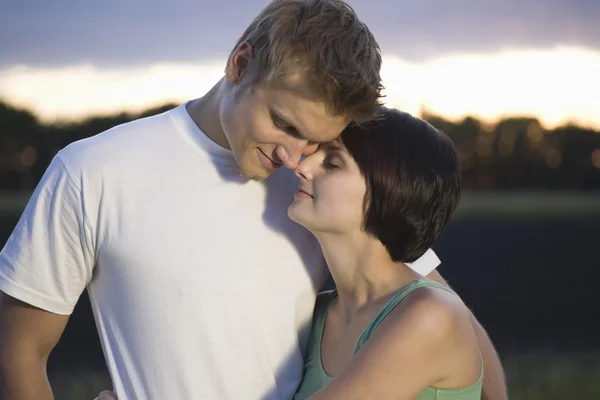 Couple stand embracing — Stock Photo, Image