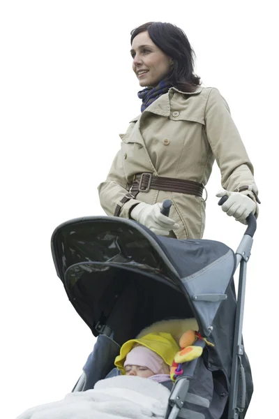 Mother with baby girl in carriage — Stock Photo, Image