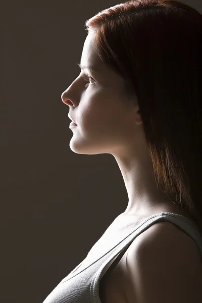 Young woman side view portrait — Stock Photo, Image