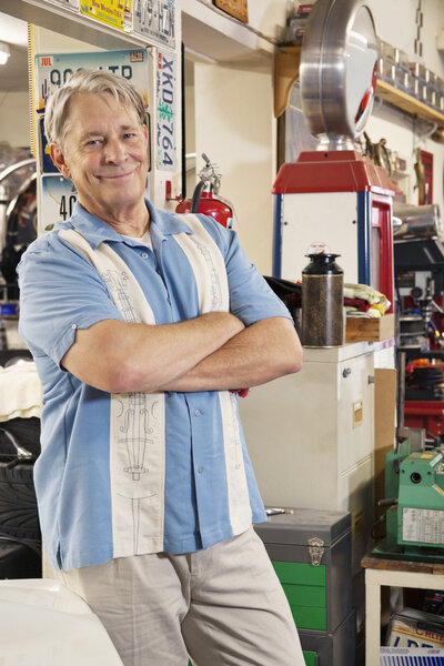 Man in automobile workshop