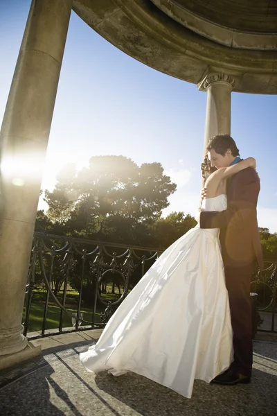 Newlywed couple embracing — Stock Photo, Image