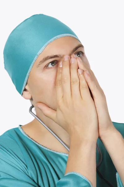 Upset male surgeon in scrubs — Stock Photo, Image