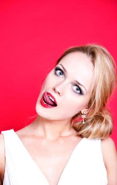 Woman licking her lips — Stock Photo, Image