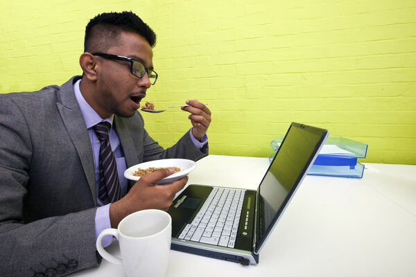 Indian businessman eating