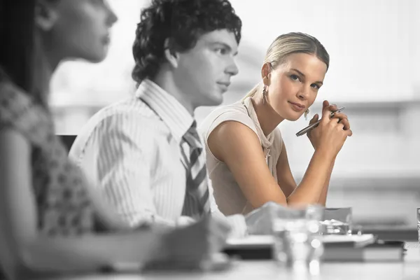 Businesswoman with colleagues — Stock Photo, Image