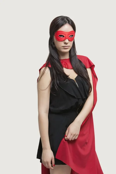 Jonge vrouw in superheld kostuum — Stockfoto