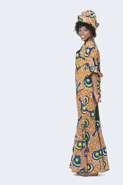 Woman in African print attire — Stock Photo, Image