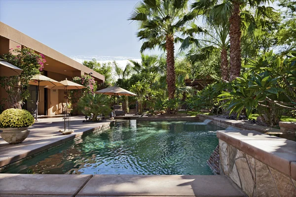 Luxury Villa with waterfall feature — Stock Photo, Image