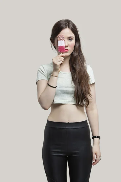 Young woman holding ice cream — Stock Photo, Image