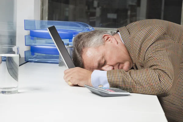 Exhausted businessman — Stock Photo, Image