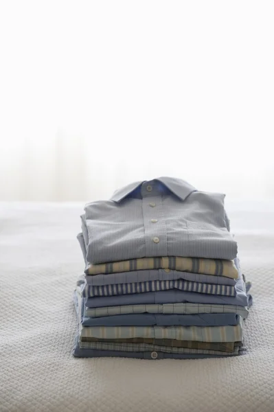 Ironed and folded shirts — Stock Photo, Image