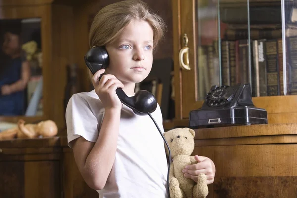 Girl using telephone — Stock Photo, Image